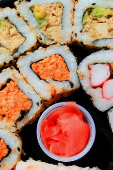 Close up of sushi assortment on a platter.
