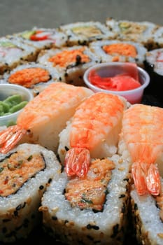 Close up of sushi assortment on a platter.
