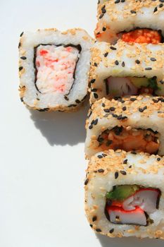 Close up of sushi assortment on a platter.
