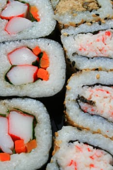 Close up of sushi assortment on a platter.
