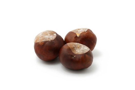 three chestnuts isolated on white background