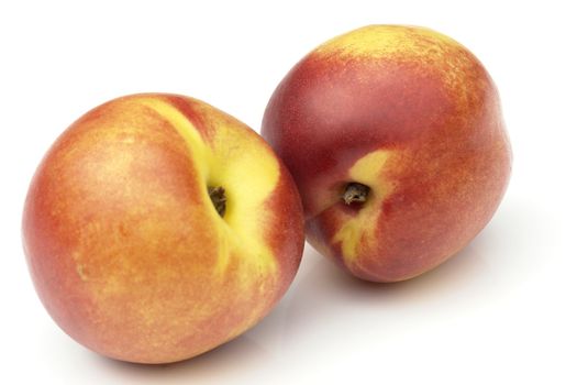 nectarines on the white background 