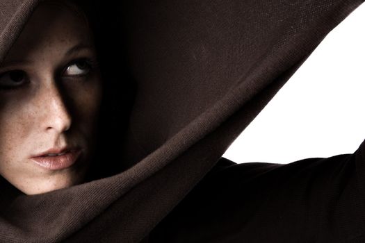 Studio portrait of a beautifull girl in a turtle neck sweater