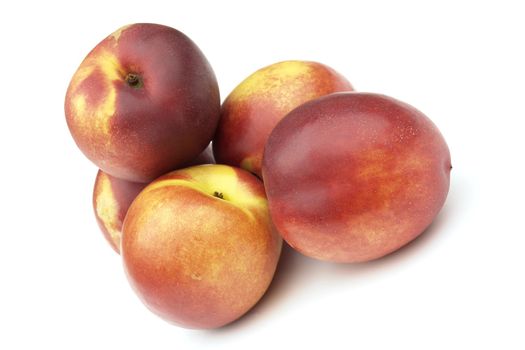 nectarines on the white background 