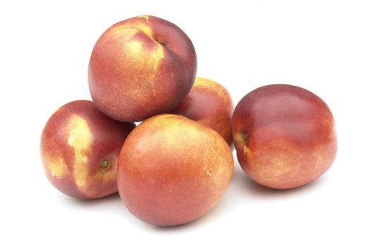 nectarines on the white background 