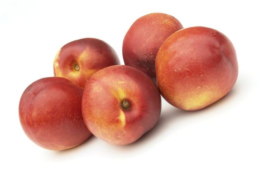 nectarines on the white background 