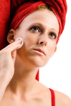 Studio portrait of a beautifull girl cleansing