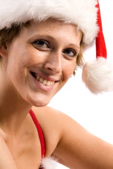 Studio portrait of blond christmas girl smiling at you