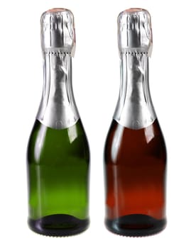 Two bottles of champagne isolated on white background