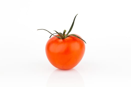 fresh tomato with shadow isolated on white.