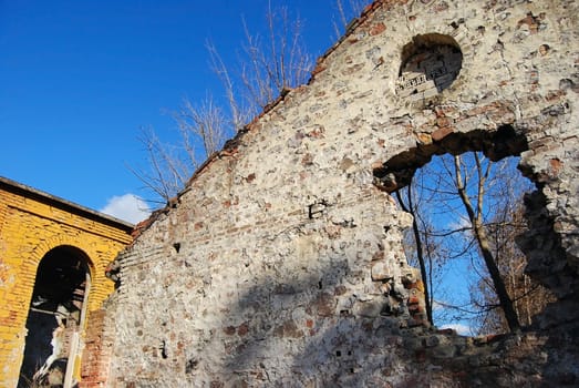 Old ruined factory destroyed  brick walls, demolition