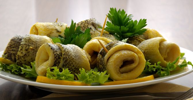 Rolls of fish (Shad) marinated in beer