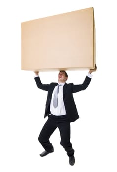 Well dressed man carrying a heavy cardboard Box isolated on white background