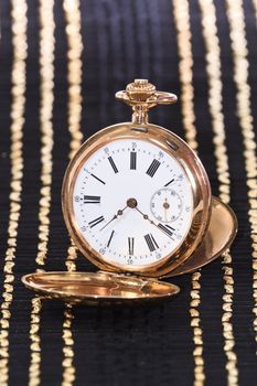 Antique gold pocket watch with diamonds