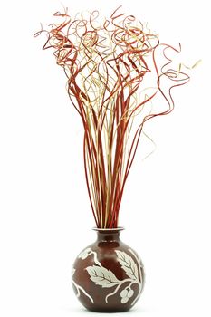 Multicolored bamboo bouquet in vase isolated on white 