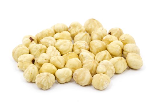 Group of white hazelnuts isolated on white background