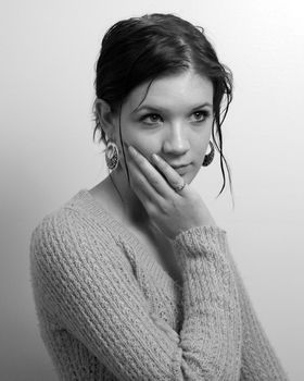 A casual black and white portrait of a young girl.