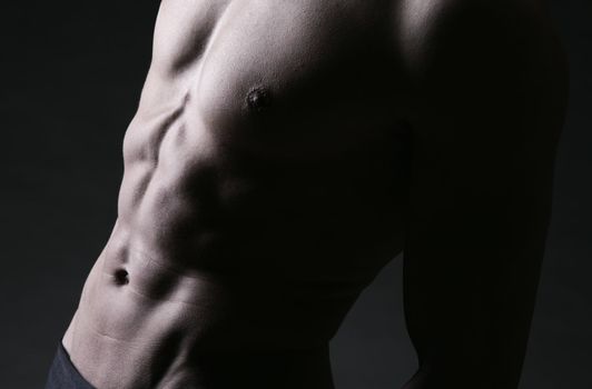 Closeup of abdomen muscles, Male Athlete