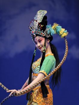 CHENGDU - JULY 23: Chinese opera actress performs traditional drama onstage at Arts Academy theater of Sichuan Jul 23, 2010 in Chengdu, China.