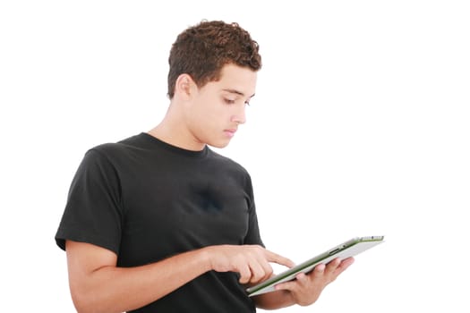 Young casual student working on a digital tablet. Isolated on a white background