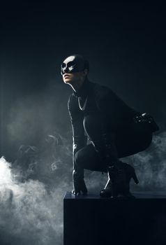Female thief in black mask