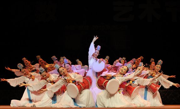CHENGDU - SEP 28: Korean ethnic dancers perform on stage in the 6th Sichuan minority nationality culture festival at JINJIANG theater.Sep 28,2010 in Chengdu, China.