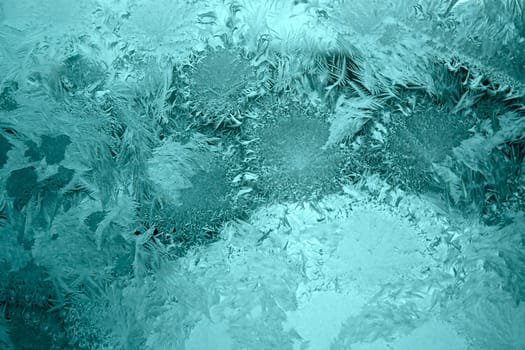 View of  frost on  glass window. Image with shallow depth of field.