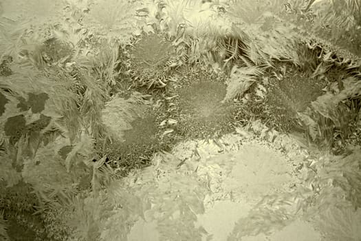 View of  frost on  glass window. Image with shallow depth of field.