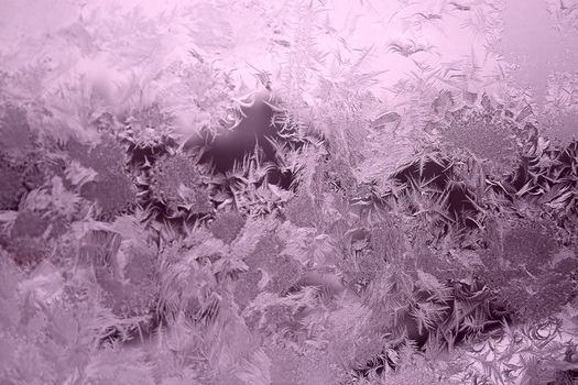 View of  frost on  glass window. Image with shallow depth of field.