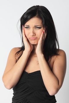 Portrait of the young and beautiful girl which the head is ill