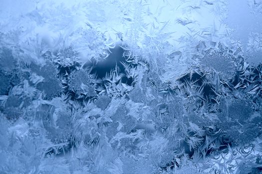 View of  frost on  glass window. Image with shallow depth of field.