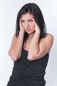 Portrait of the young and beautiful girl which the head is ill