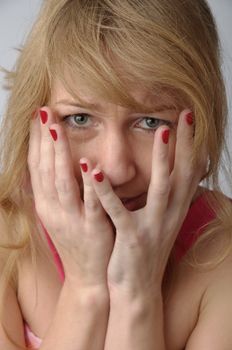 Portrait of the young and beautiful girl which the head is ill