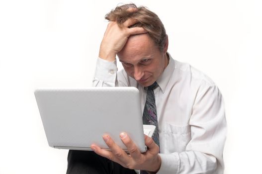 Portrait of middle-aged man with a white laptop computer