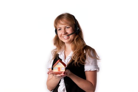 Little House in the hands of young and beautiful business woman