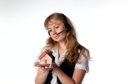 Little House in the hands of young and beautiful business woman