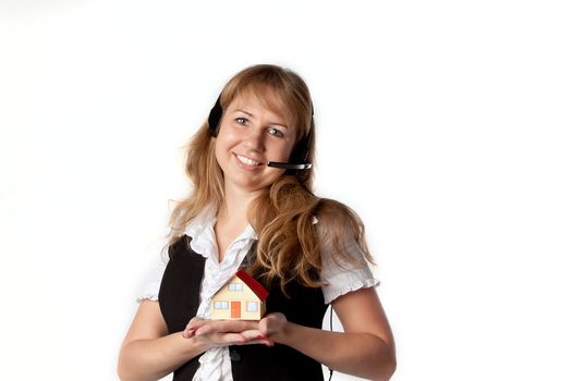 Little House in the hands of young and beautiful business woman