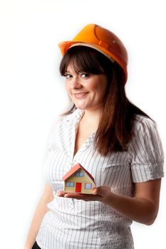 Little House in the hands of young and beautiful business woman
