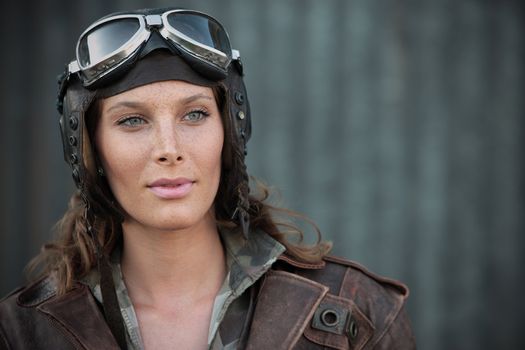 Portrait of young woman aviator