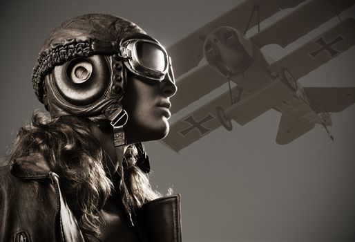 Portrait of young woman airplane pilot