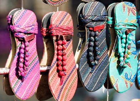 Colorful traditional shoes for sale in Rajasthan. India, Asia
