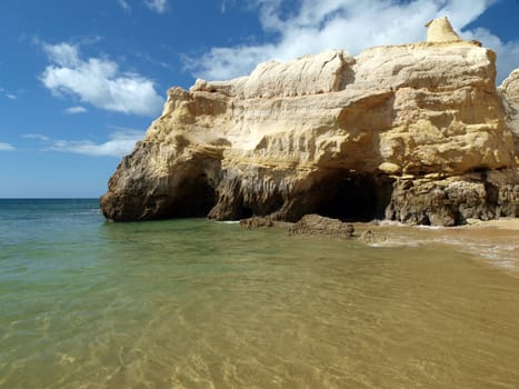 A section of the idyllic Praia de Rocha beach on the southern coast of the Portuguese Algarve region.