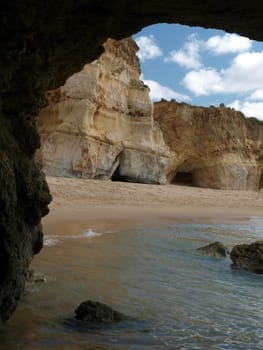 A section of the idyllic Praia de Rocha beach on the southern coast of the Portuguese Algarve region.