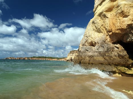 A section of the idyllic Praia de Rocha beach on the southern coast of the Portuguese Algarve region.