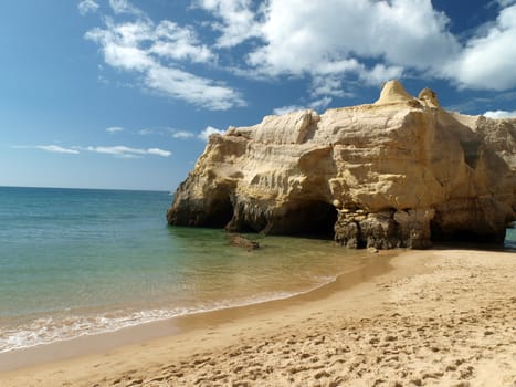 A section of the idyllic Praia de Rocha beach on the southern coast of the Portuguese Algarve region.