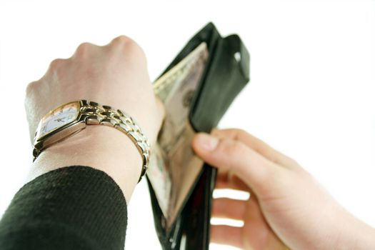 the male hands take from the purse a fifty dollars