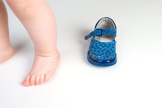 Children's leg and shoes.copyspace
