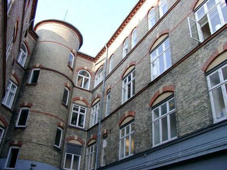 View of internal yard of the house with a lot of windows.