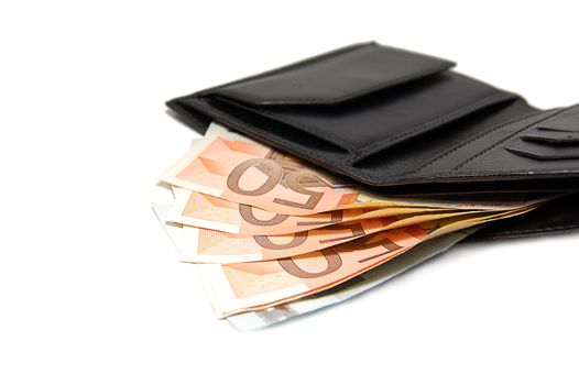 Fifty euro banknotes in leather black purse isolated on white