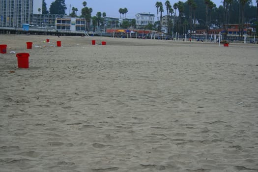Polluted sandy beach during day time.
